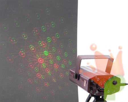 PROIETTORE LASER CON MOVIMENTO A RITMO DI MUSICA 12x9x5cm