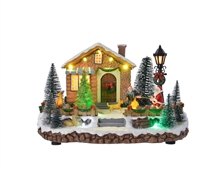 VILLAGGIO CON CASA 21X26X17CM 10LED SUONO  A BATTERIA N110