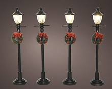 LAMPIONCINI IN POLIRESINA 4 PZ PER VILLAGGIO NATALIZIO H.10 CM