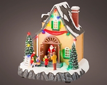CASA DI BABBO NATALE IN POLIRESINA CON LED MULTICOLOR H.21,5X18X
