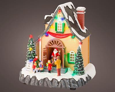 CASA DI BABBO NATALE IN POLIRESINA CON LED MULTICOLOR H.21,5X18X