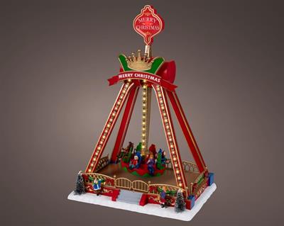 VILLAGGIO DI NATALE GIOSTRA A PENDOLO LUMINOSA 20,3X29X41,5CM